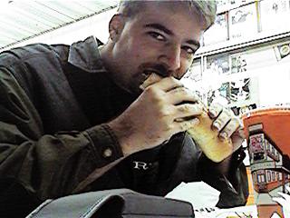 Eating a Geno's steak.