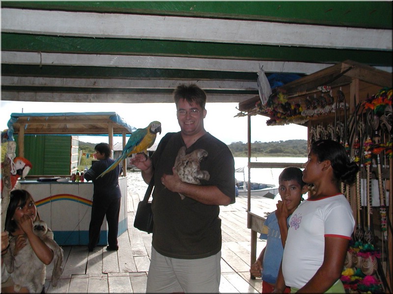 Don with a sloth and macaw.jpg